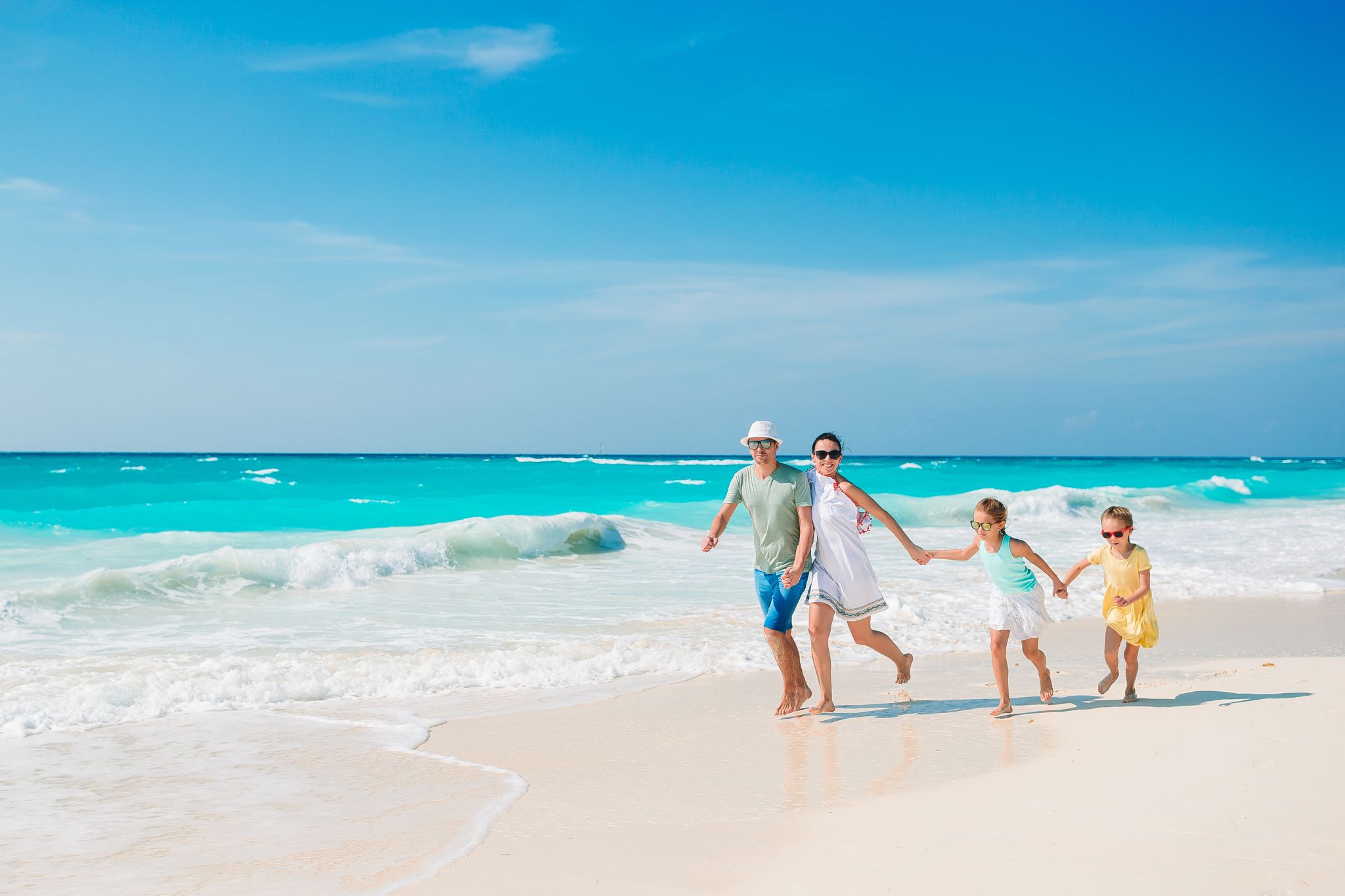 Zanzibar beach tours for families enjoying white sand beach