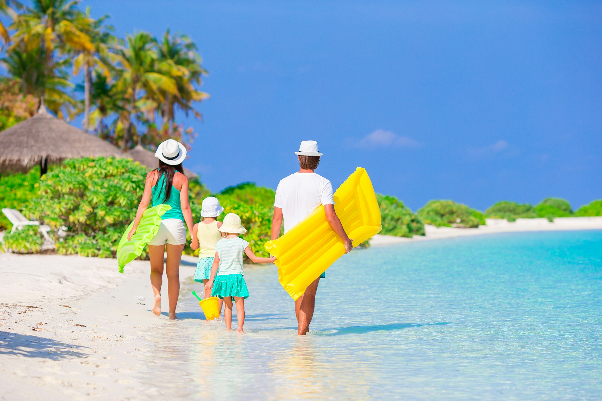 Zanzibar beach tours for families enjoying white sand beach