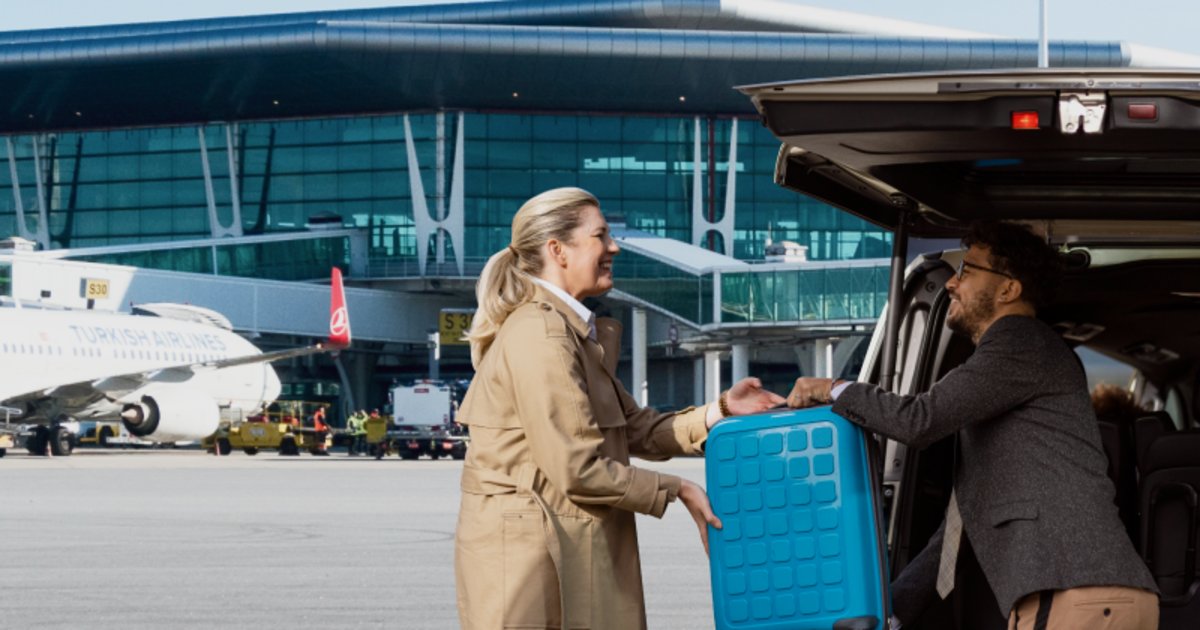 friendly driver welcoming tourist at Zanzibar airport service