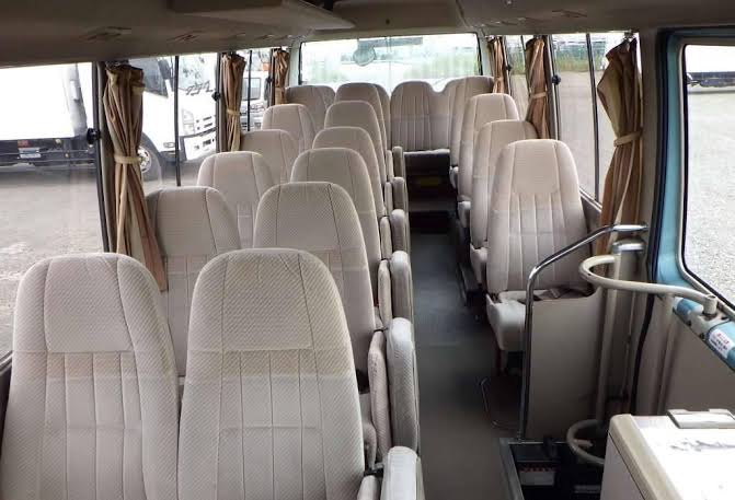 coaster bus in side